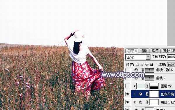 Photoshop将草原人物图片调制出唯美的暗调红蓝色