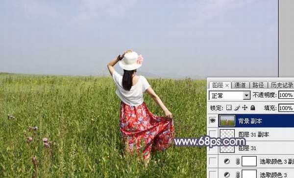 Photoshop将草原人物图片调制出唯美的暗调红蓝色
